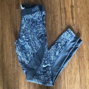 Nike mosaic print leggings with grey mesh inserts